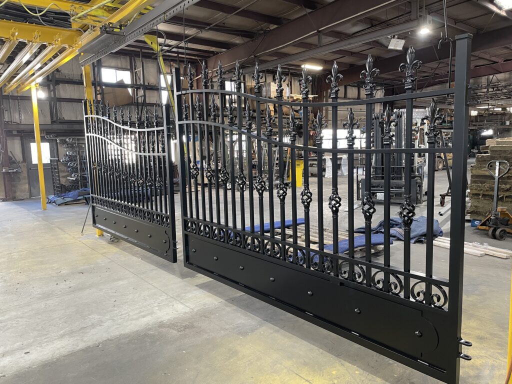 iron gate with intricate designs with black powder coating